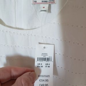 GAP Dresses - NWT white eyelet dress with pockets from the Gap GAP Dresses - NWT white eyelet dress with pockets from the Gap